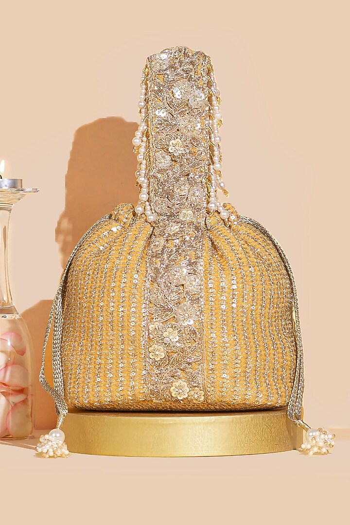 Light Orange Georgette & Poly Silk Sequins Embellished Bucket Bag by AMYRA at Pernia's Pop Up Shop