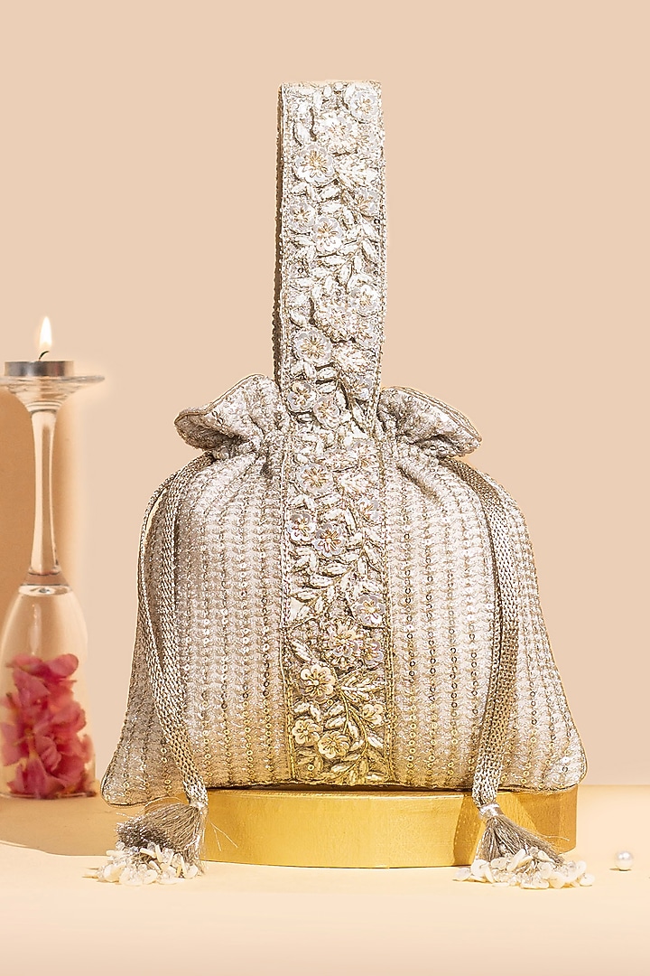 Champagne Georgette Sequins Embellished Potli by AMYRA at Pernia's Pop Up Shop
