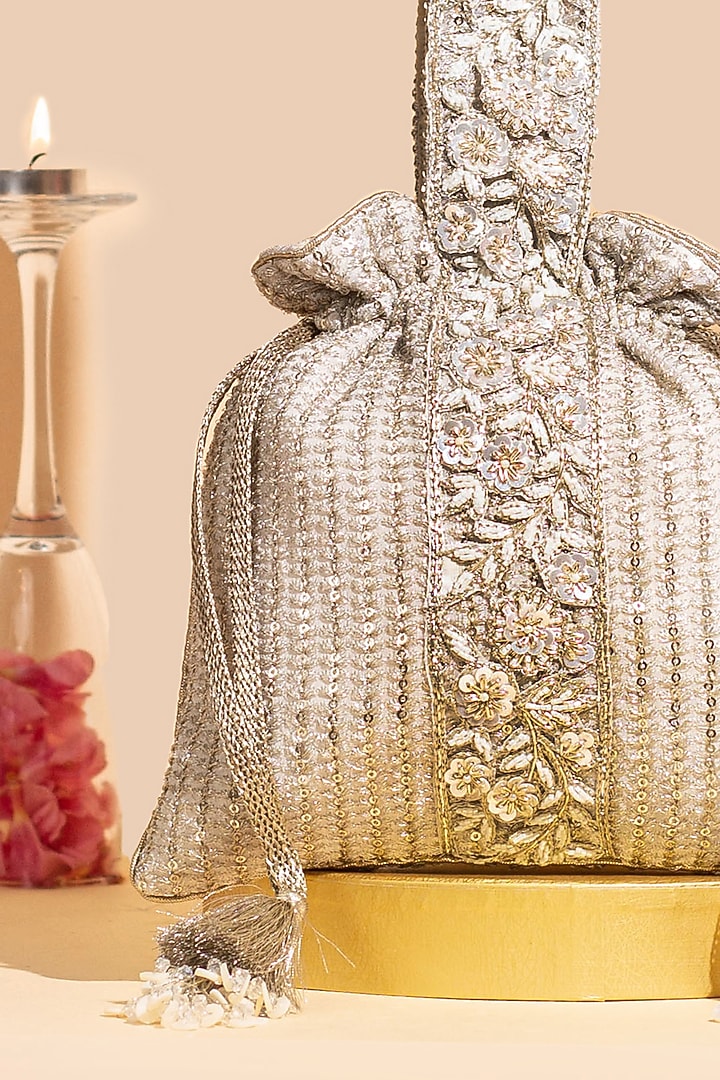 Champagne Georgette Sequins Embellished Potli by AMYRA at Pernia's Pop Up Shop