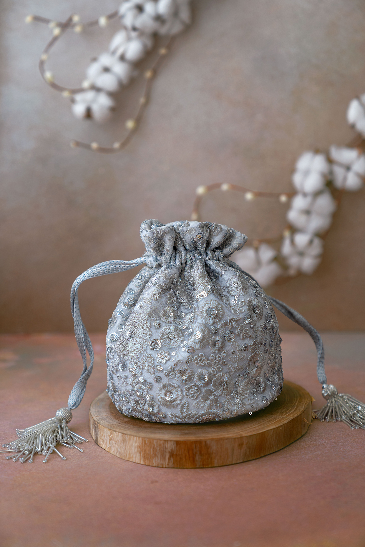 Silver Net Embroidered Potli by AMYRA at Pernia's Pop Up Shop