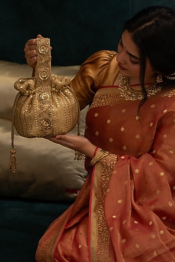 Gold Georgette Mirror Embroidered Round Potli by AMYRA at Pernia's Pop Up Shop