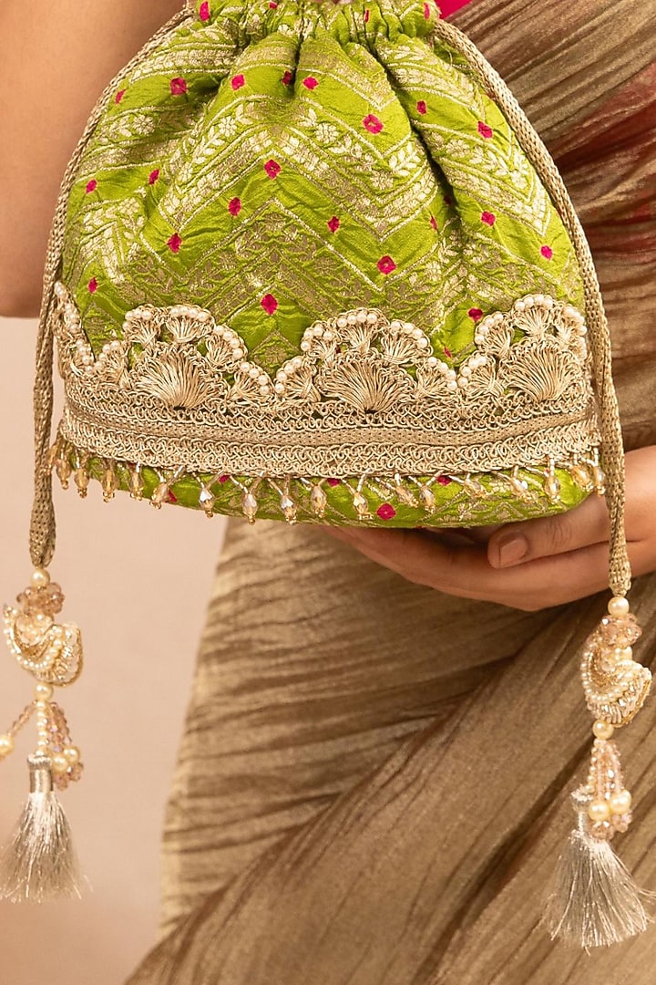 Green Bandhani Silk Lace Embellished Bucket Bag by AMYRA at Pernia's Pop Up Shop