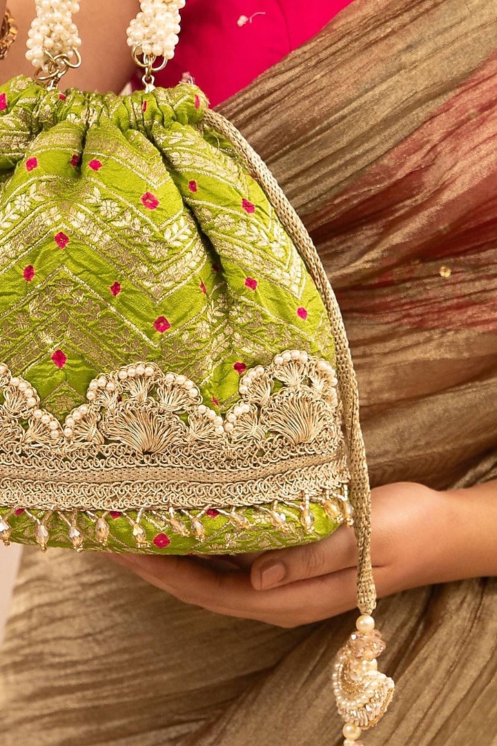 Green Bandhani Silk Lace Embellished Bucket Bag by AMYRA at Pernia's Pop Up Shop