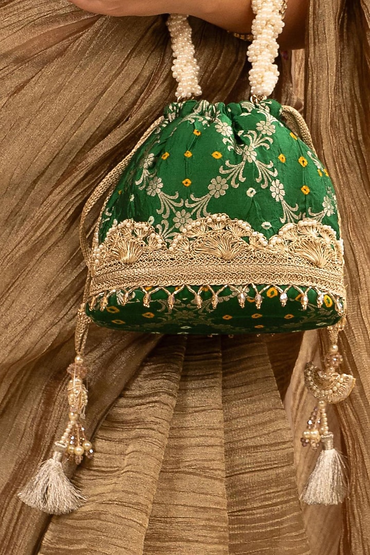 Green Bandhani Silk Lace Embellished Bucket Bag by AMYRA at Pernia's Pop Up Shop