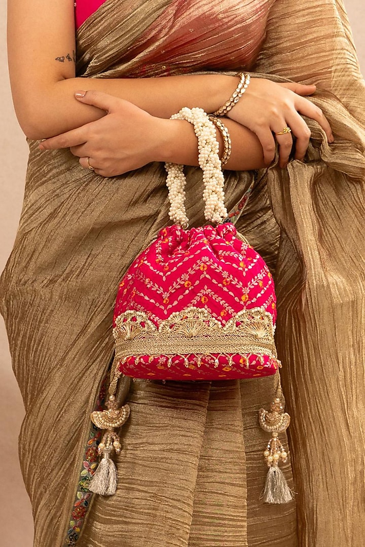 Pink Bandhani Silk Lace Embellished Bucket Bag by AMYRA at Pernia's Pop Up Shop