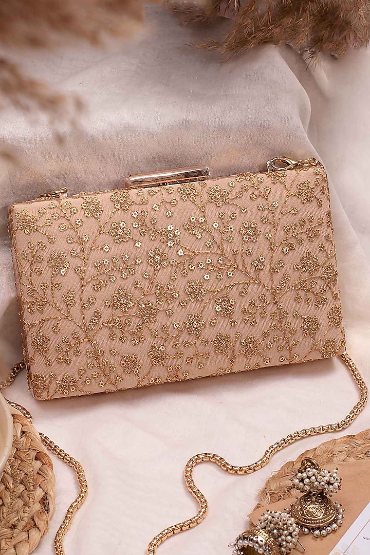 Beige Net Embroidered Clutch by AMYRA