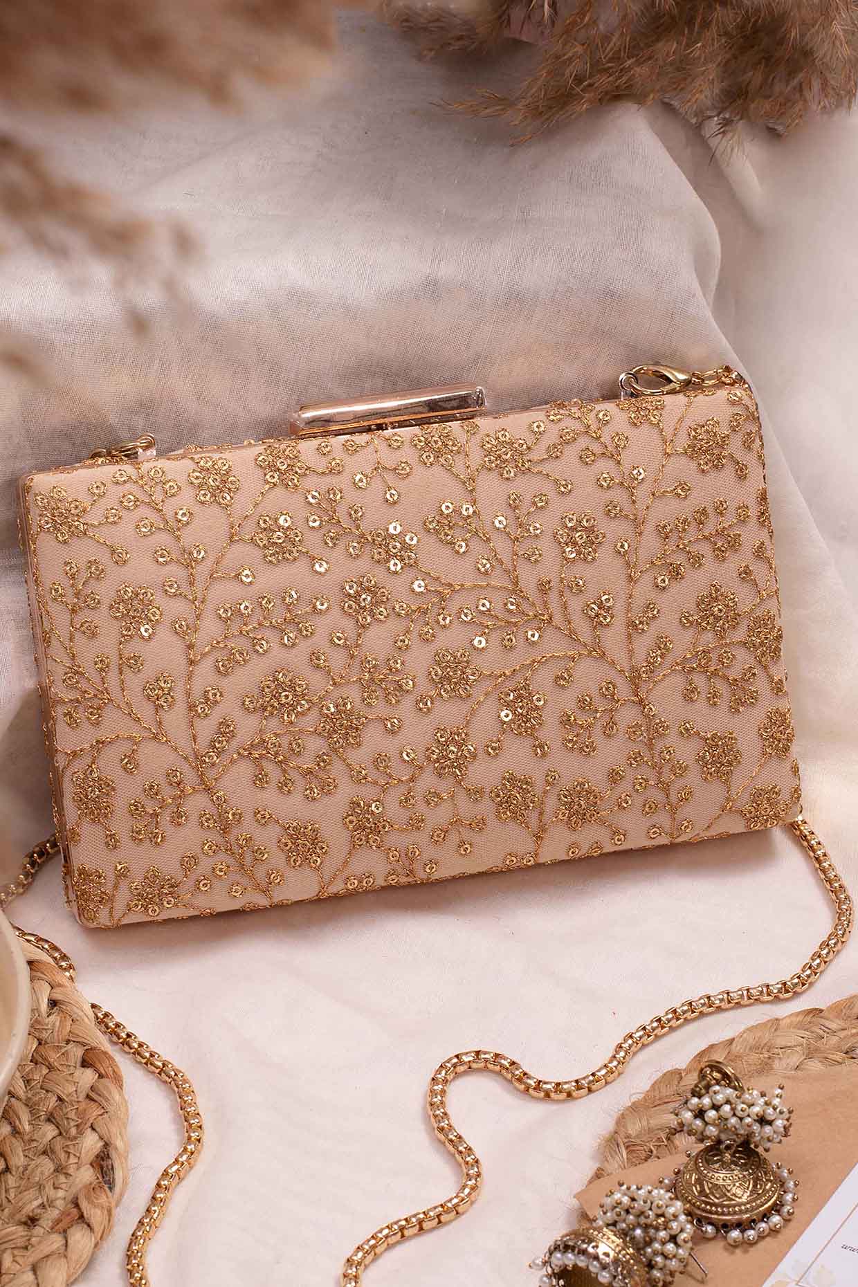 Beige Net Embroidered Clutch by AMYRA