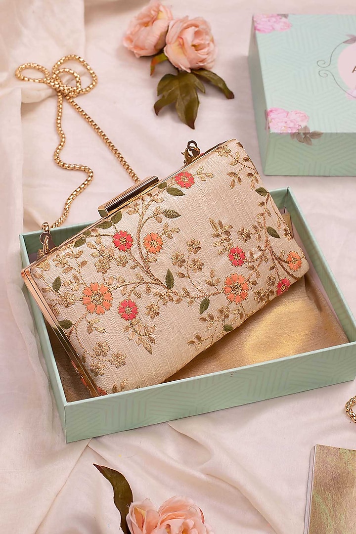Cream Poly Silk Embroidered Clutch by AMYRA