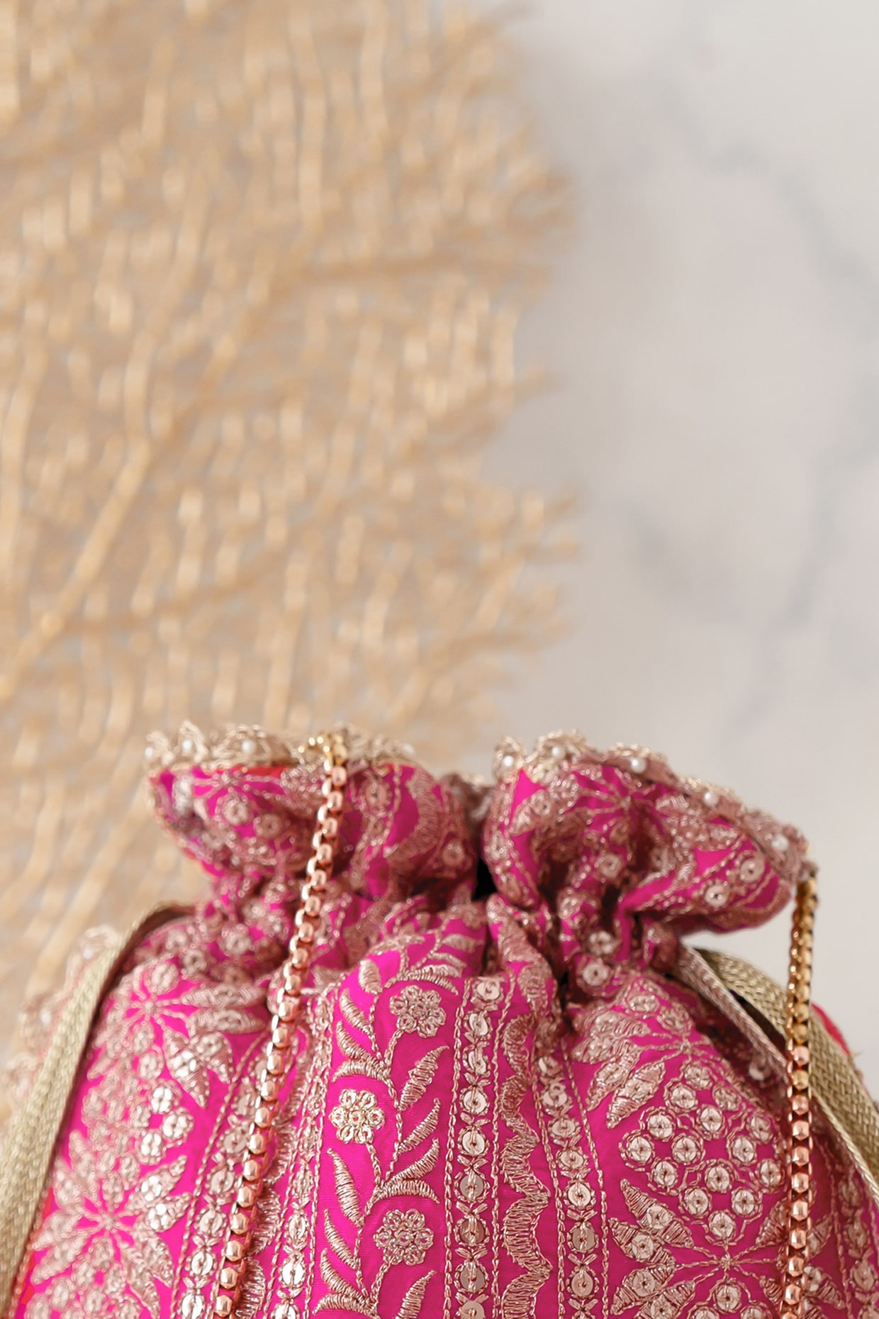 Buy Gold Embroidered Bella Handcrafted Potli Bag by AMYRA Online at Aza  Fashions.