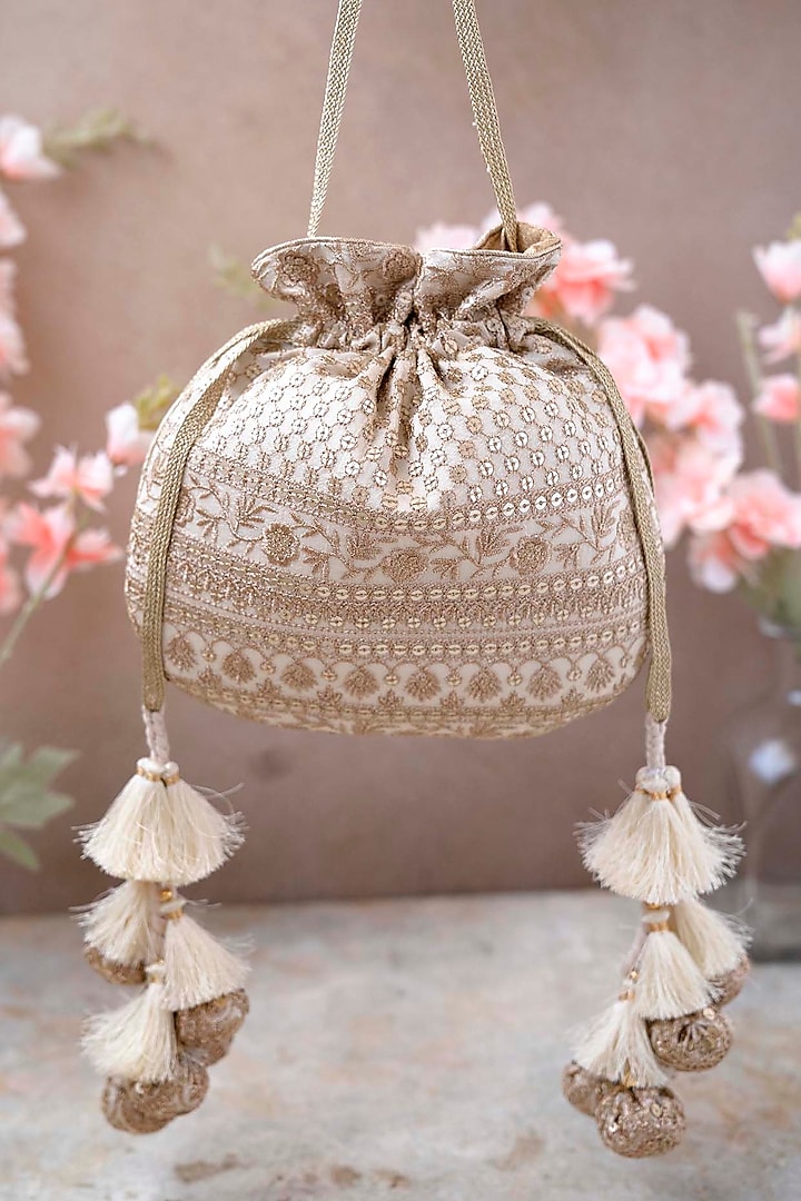 Off-White Silk Embroidered Potli Bag by AMYRA