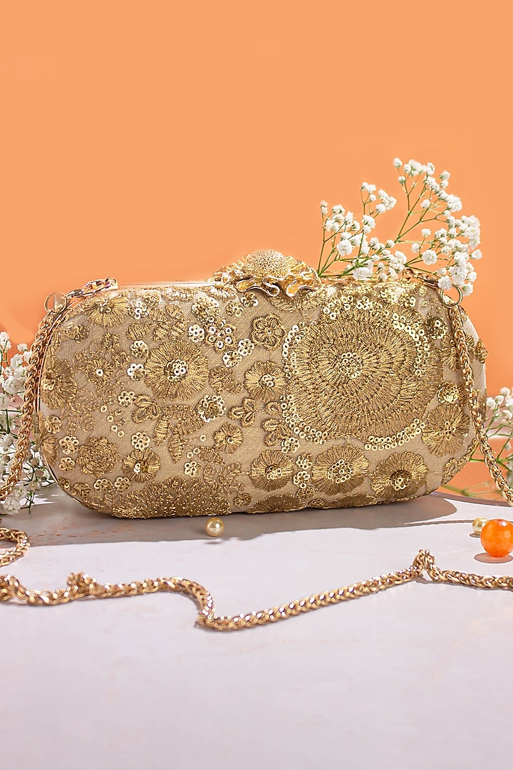 Gold Net Embroidered Clutch by AMYRA