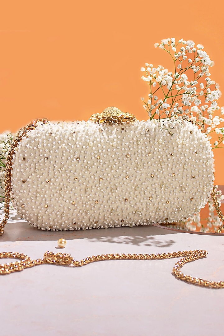 White Poly Silk Embroidered Clutch by AMYRA at Pernia's Pop Up Shop