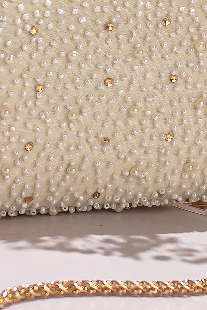 White Poly Silk Embroidered Clutch by AMYRA at Pernia's Pop Up Shop
