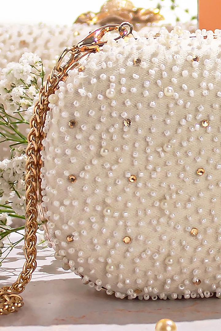 White Poly Silk Embroidered Clutch by AMYRA at Pernia's Pop Up Shop
