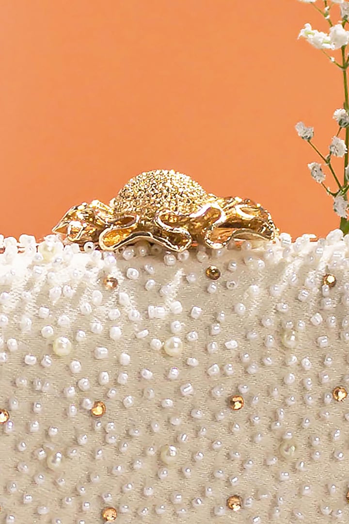 White Poly Silk Embroidered Clutch by AMYRA at Pernia's Pop Up Shop