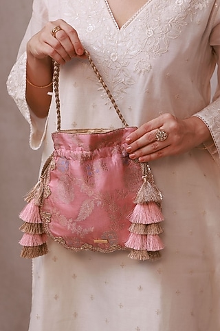 Light Pink Handwoven Silk Embroidered Potli by AMYRA