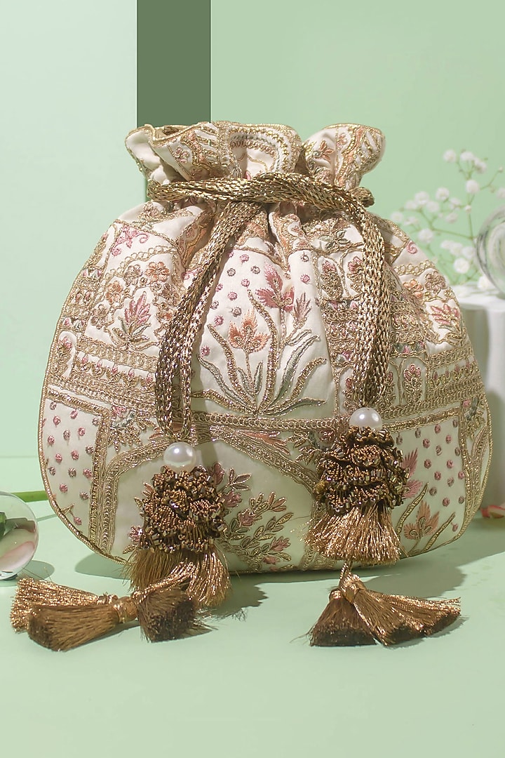 Off-White Silk Embroidered Potli by AMYRA at Pernia's Pop Up Shop