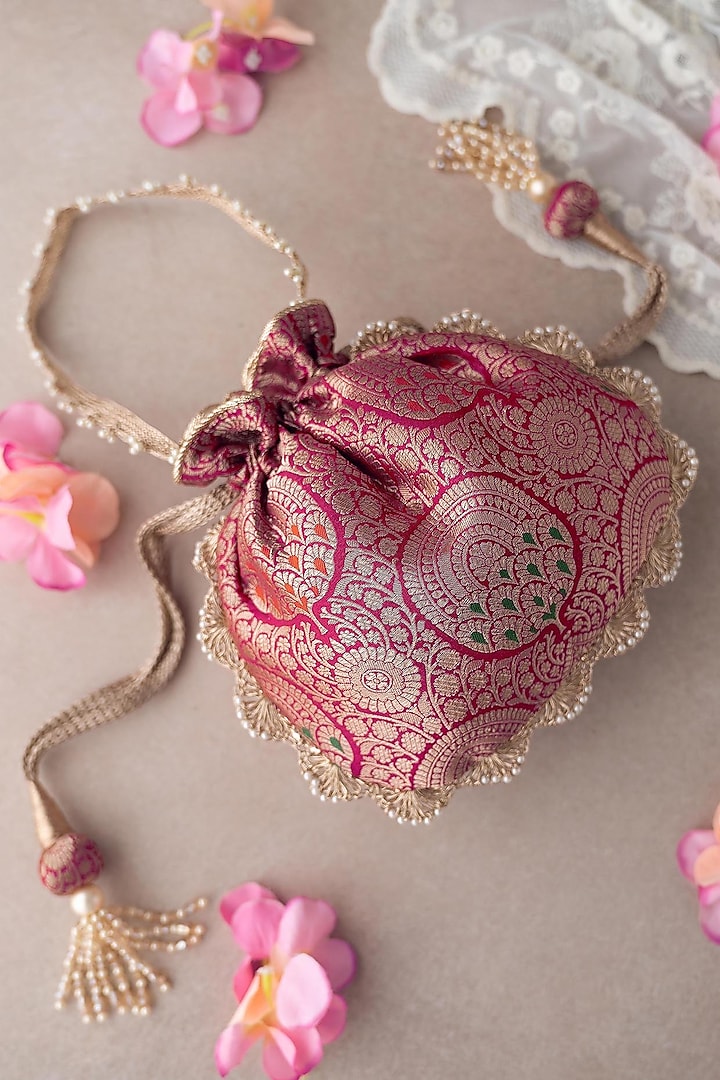 Dark Pink Banarasi Silk Embroidered Potli by AMYRA