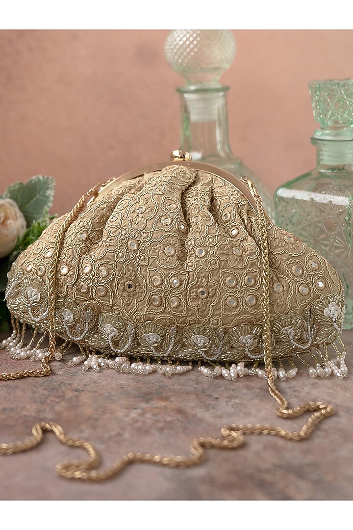 Gold Poly Silk Embroidered Potli by AMYRA at Pernia's Pop Up Shop