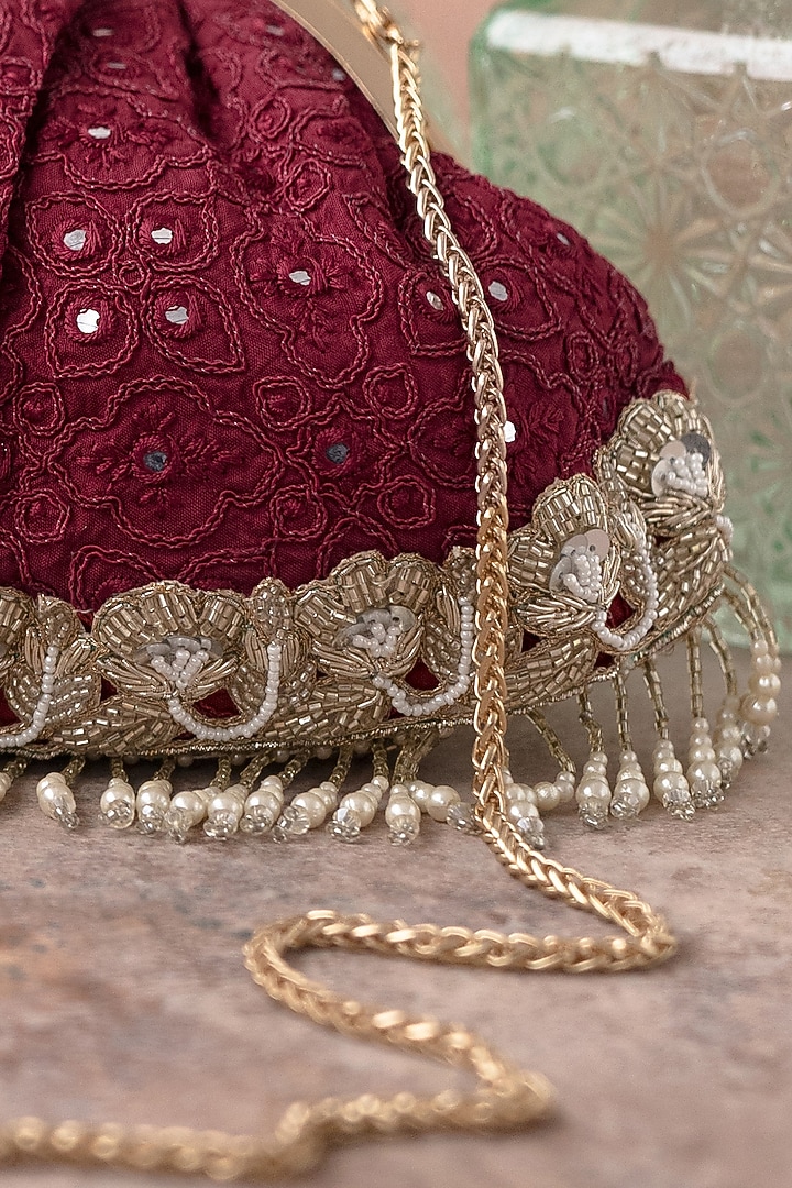 Maroon Poly Silk Embroidered Potli by AMYRA at Pernia's Pop Up