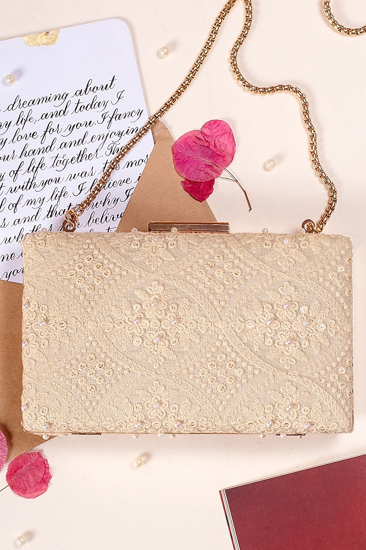 Beige Georgette Embroidered Clutch by AMYRA