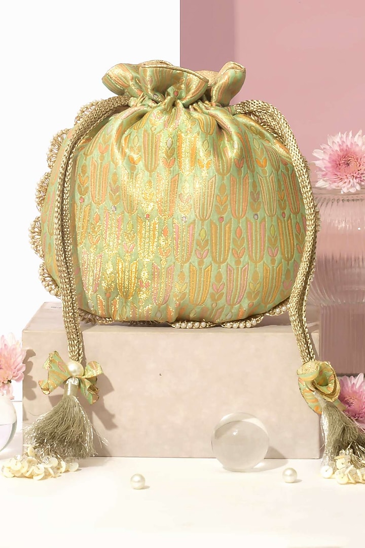 Green Pure Banarasi Silk & Tissue Pearl Embellished Potli by AMYRA at Pernia's Pop Up Shop