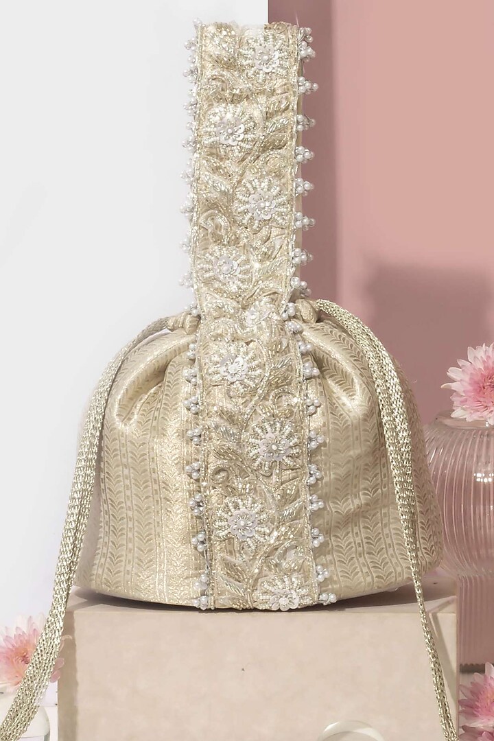 Silver Banarasi Hand Embroidered Bucket Bag by AMYRA at Pernia's Pop Up Shop
