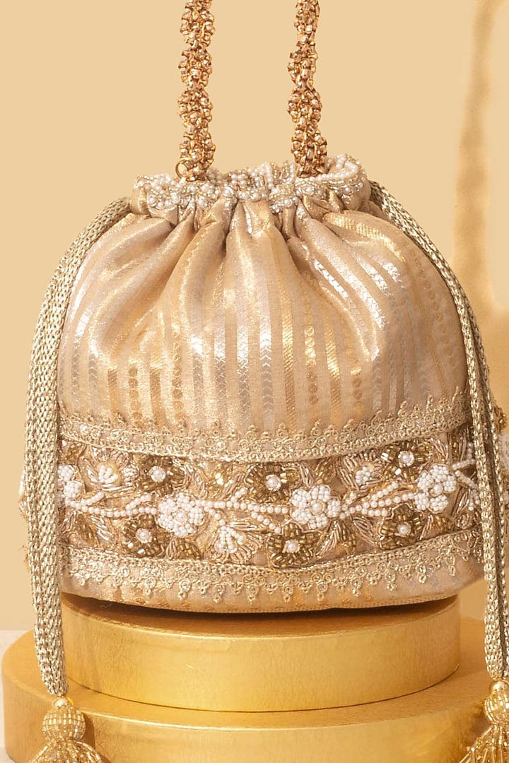 Gold Tissue Silk Pearl Embroidered Bucket Bag by AMYRA at Pernia's Pop Up Shop