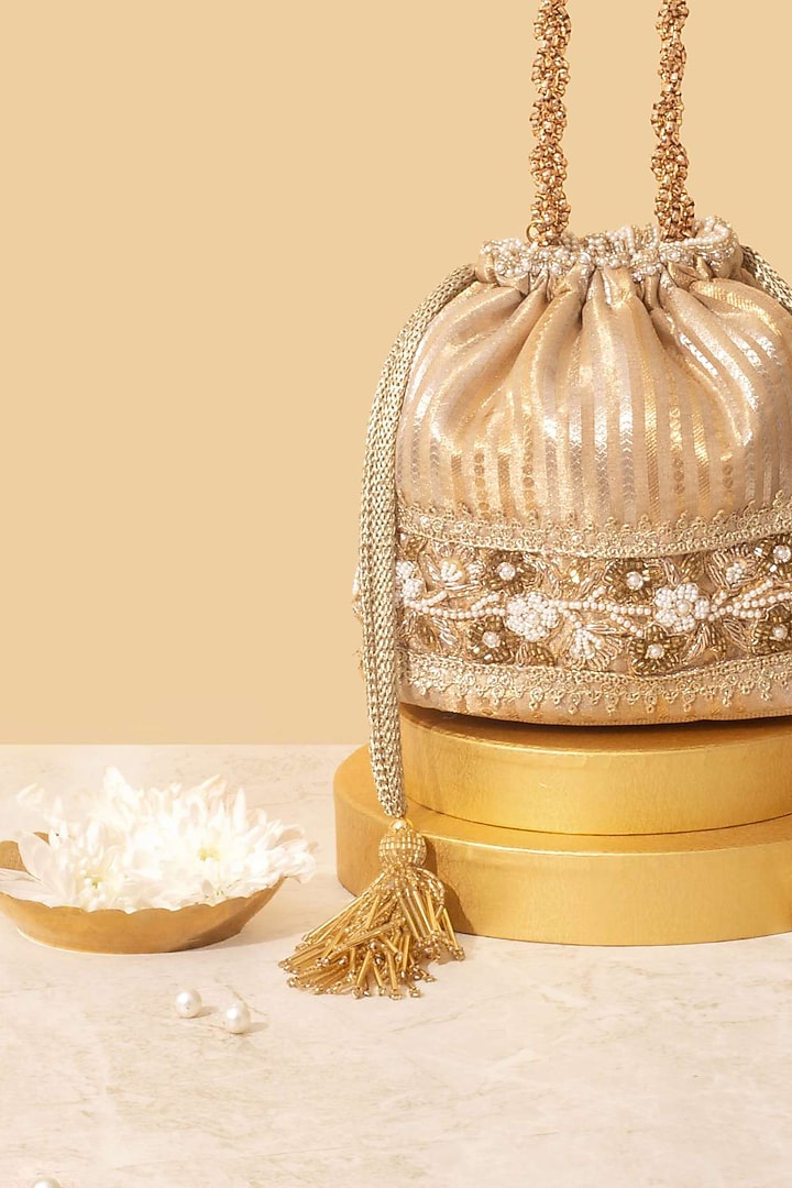 Gold Tissue Silk Pearl Embroidered Bucket Bag by AMYRA at Pernia's Pop Up Shop