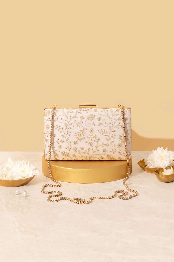 Off-White Silk Embroidered Clutch by AMYRA at Pernia's Pop Up Shop
