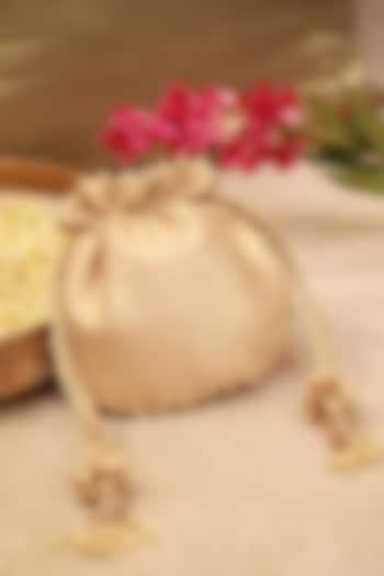 Ivory Banarasi Fabric Cutdana Embroidered Potli by AMYRA at Pernia's Pop Up Shop