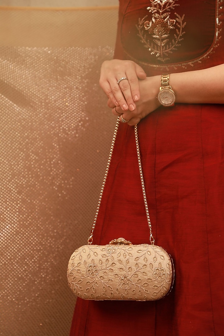 Gold Tissue Cutwork Thread Embroidered Clutch by AMYRA at Pernia's Pop Up Shop