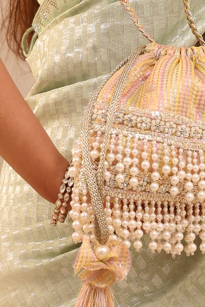 Multi-Colored Organza Tissue Pearl Tassels Embroidered Potli Bag by AMYRA at Pernia's Pop Up Shop