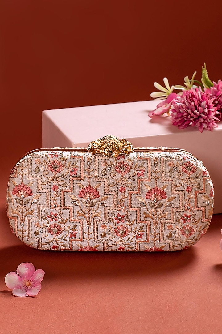 Off White Silk Embroidered Clutch by AMYRA