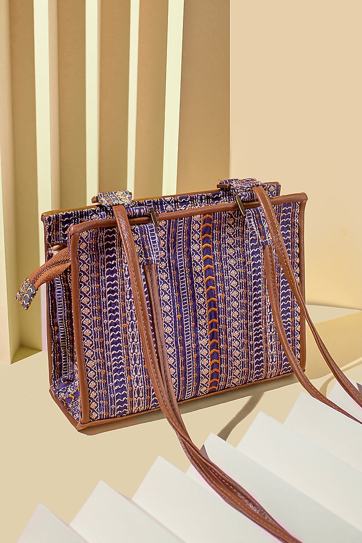 Navy Embroidered Sling Bag by AMYRA at Pernia's Pop Up Shop