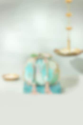 Blue Pure Banarasi Silk Pearl Embellished Potli by AMYRA at Pernia's Pop Up Shop