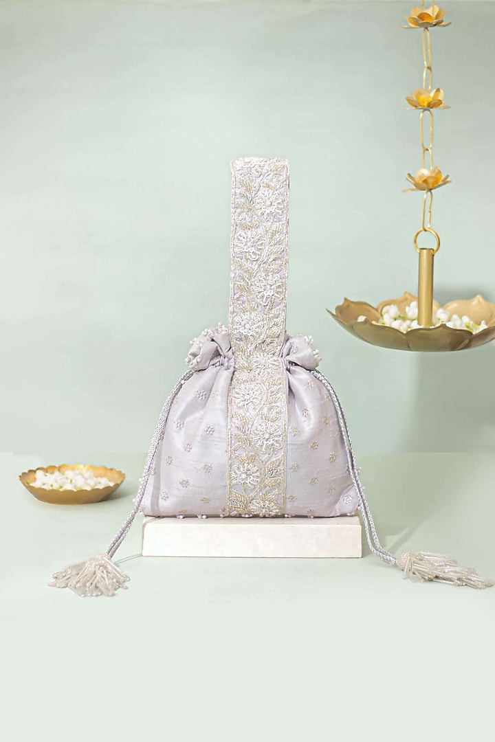 Silver Silk Lace Embroidered Potli by AMYRA at Pernia's Pop Up Shop