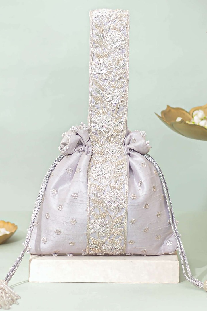 Silver Silk Lace Embroidered Potli by AMYRA at Pernia's Pop Up Shop