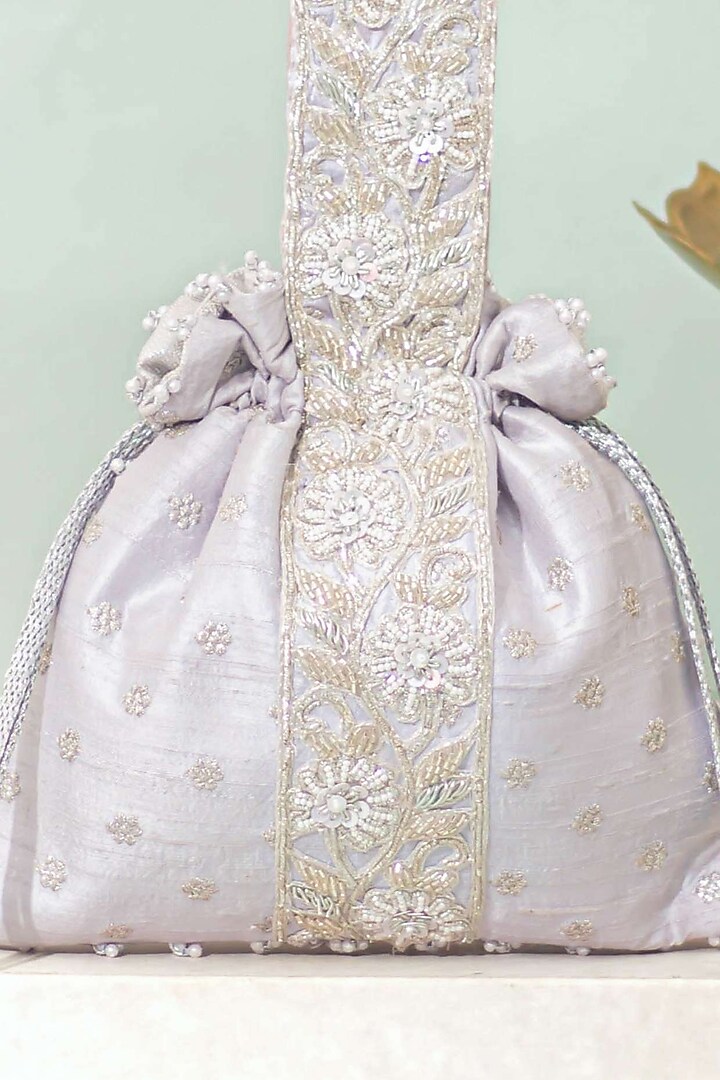 Silver Silk Lace Embroidered Potli by AMYRA at Pernia's Pop Up Shop