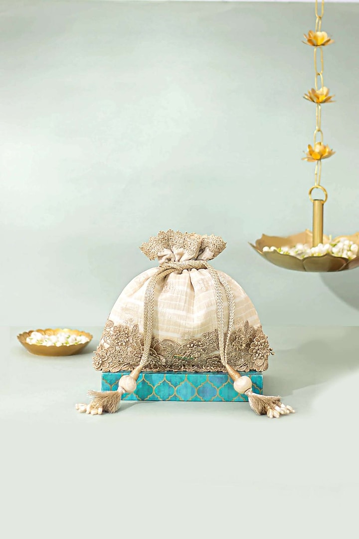 Off-White Pure Silk Potli by AMYRA at Pernia's Pop Up Shop