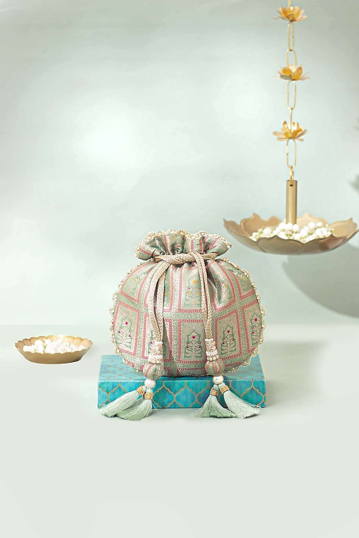 Teal Pure Banarasi Silk Pearl Embellished Potli by AMYRA at Pernia's Pop Up Shop