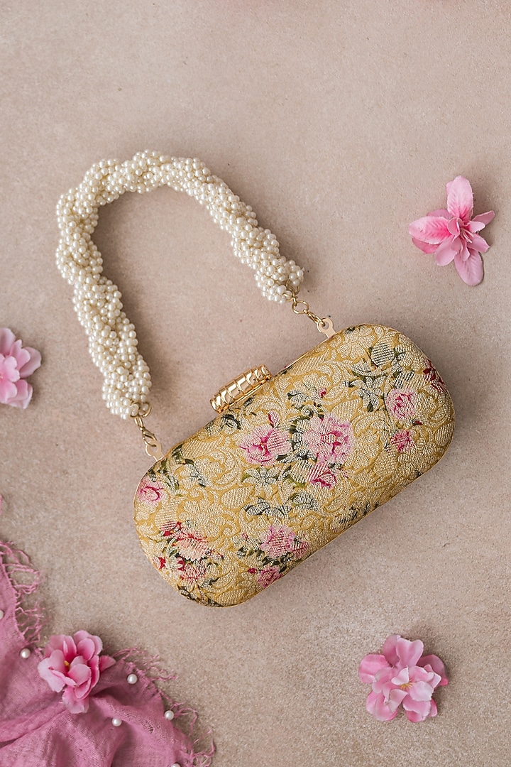 Mustard Floral Printed Clutch by AMYRA at Pernia's Pop Up Shop