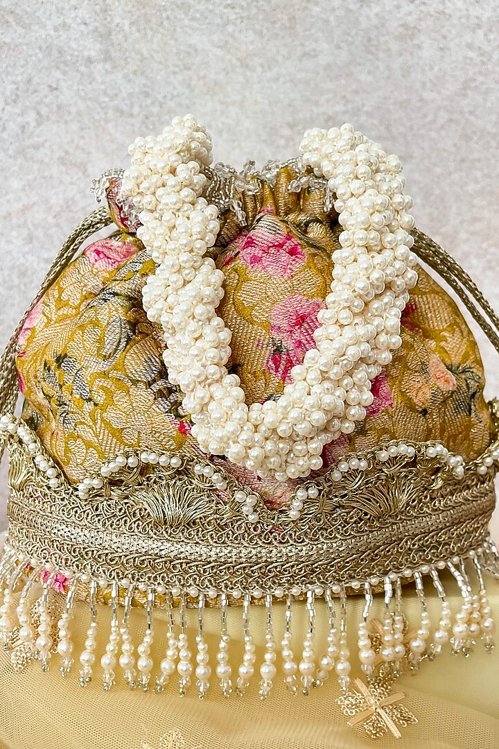 Mustard Floral Printed Potli by AMYRA at Pernia's Pop Up Shop