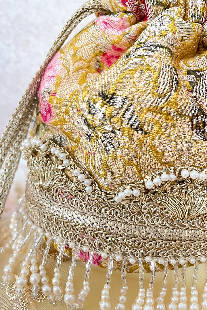 Mustard Floral Printed Potli by AMYRA at Pernia's Pop Up Shop
