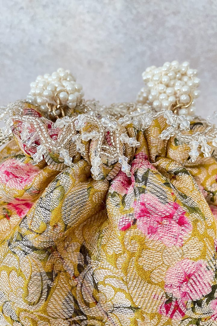 Mustard Floral Printed Potli by AMYRA at Pernia's Pop Up Shop