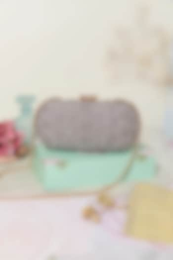 Grey Lace Cutwork Fabric Clutch by AMYRA at Pernia's Pop Up Shop