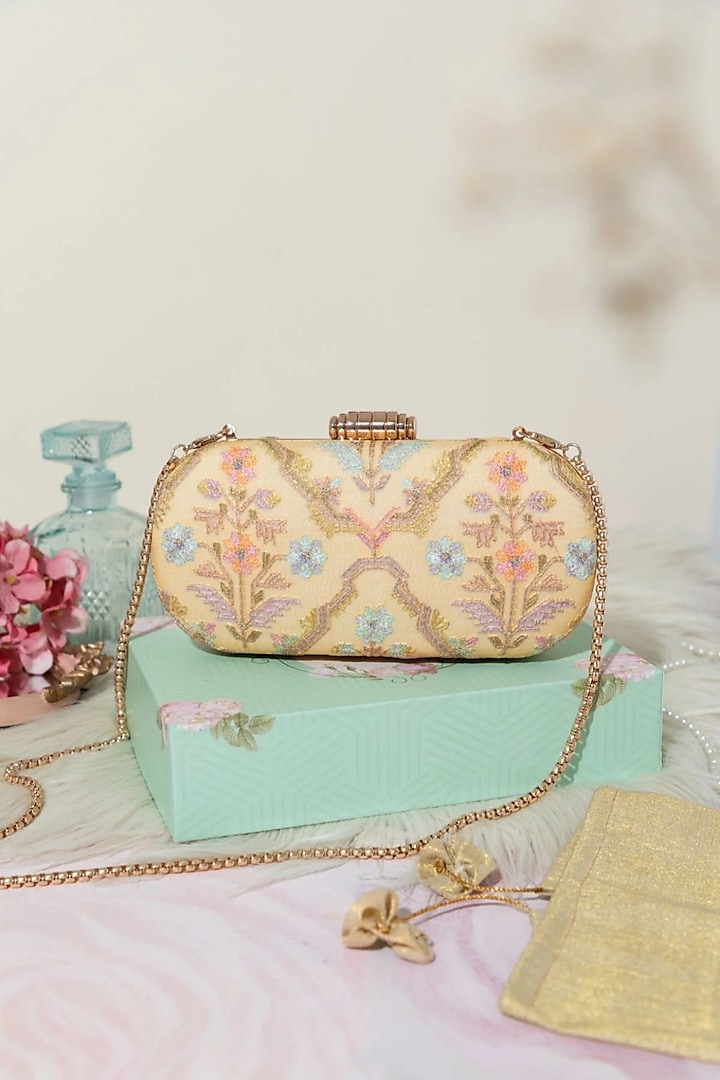 Light Yellow Organza Thread Embroidered Clutch by AMYRA at Pernia's Pop Up Shop