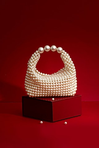 Off-White Hand-Selected Pearl Hand Bag by AMYRA