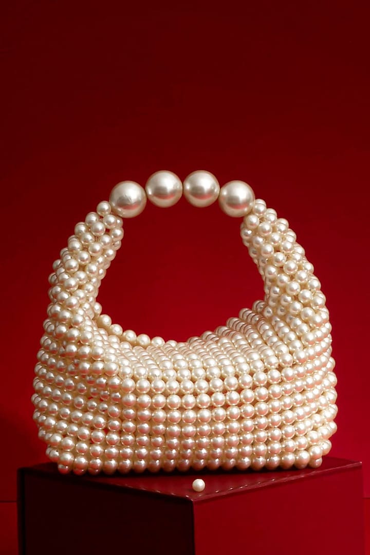 Off-White Hand-Selected Pearl Hand Bag by AMYRA at Pernia's Pop Up Shop