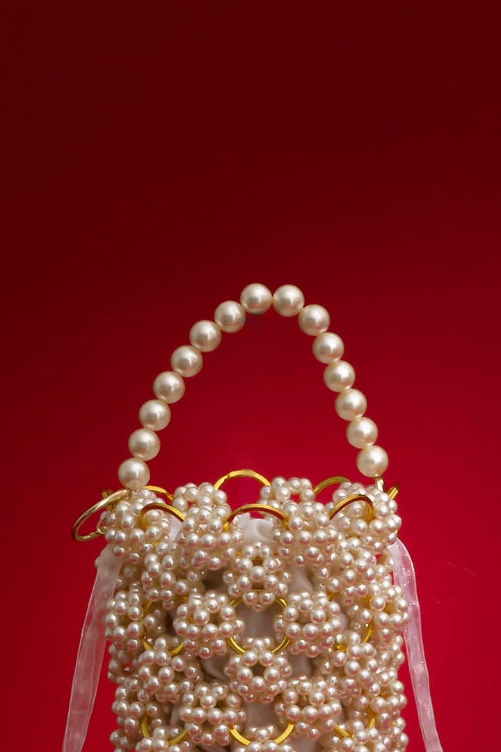 Off-White Hand-Selected Pearl Bucket Bag by AMYRA at Pernia's Pop Up Shop